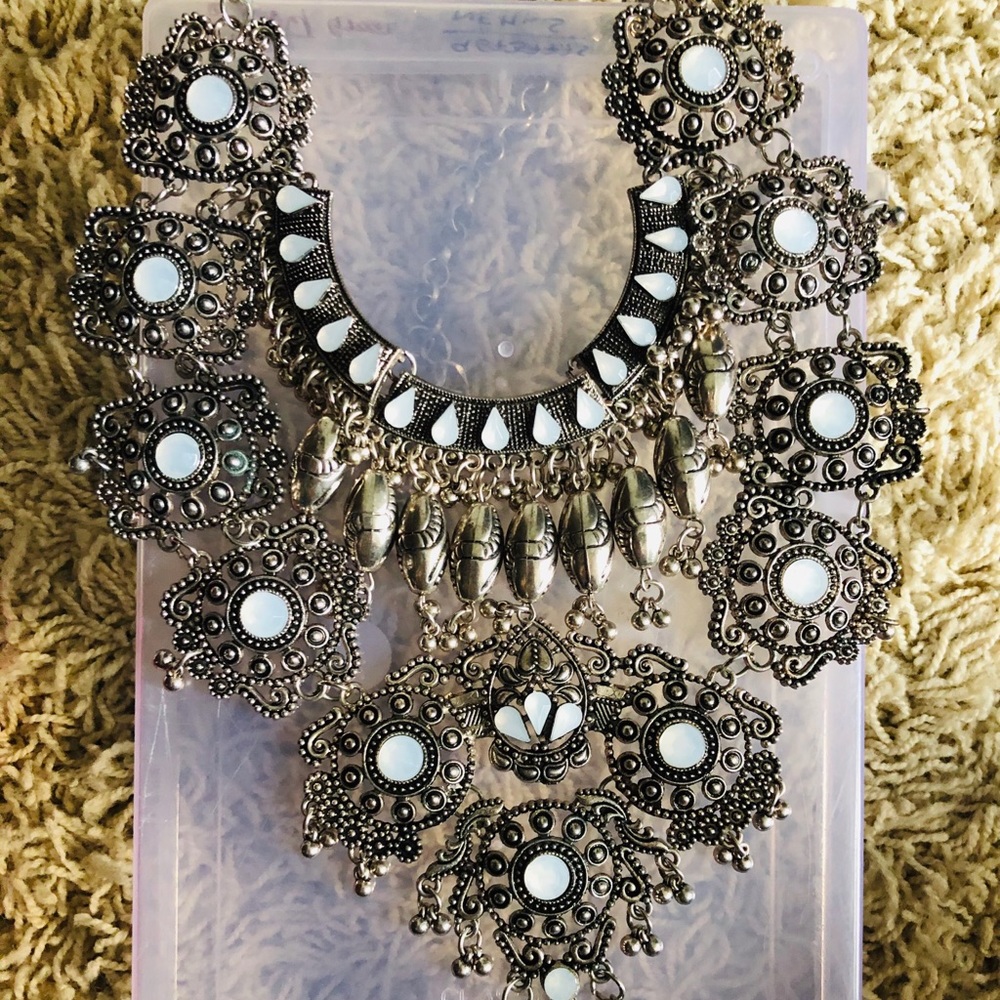 Statement necklace with white rhinestones